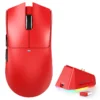 Red Attack Shark X11 wireless gaming mouse positioned next to its matching red magnetic charging dock.