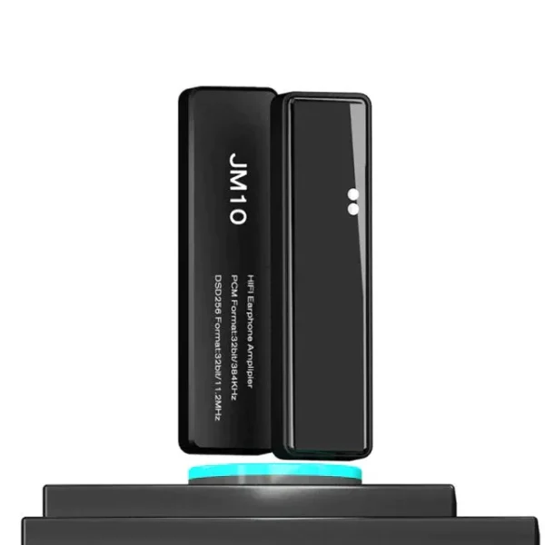 Black edition of the JCALLY JM10 DAC Headphone Amplifier standing on a display pedestal.